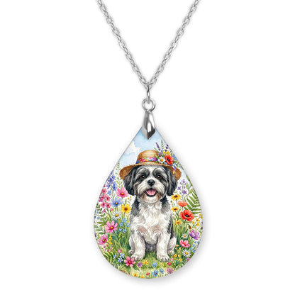 Black and White Shih Tzu wildflower teardrop pendant necklace on a silver-tone chain