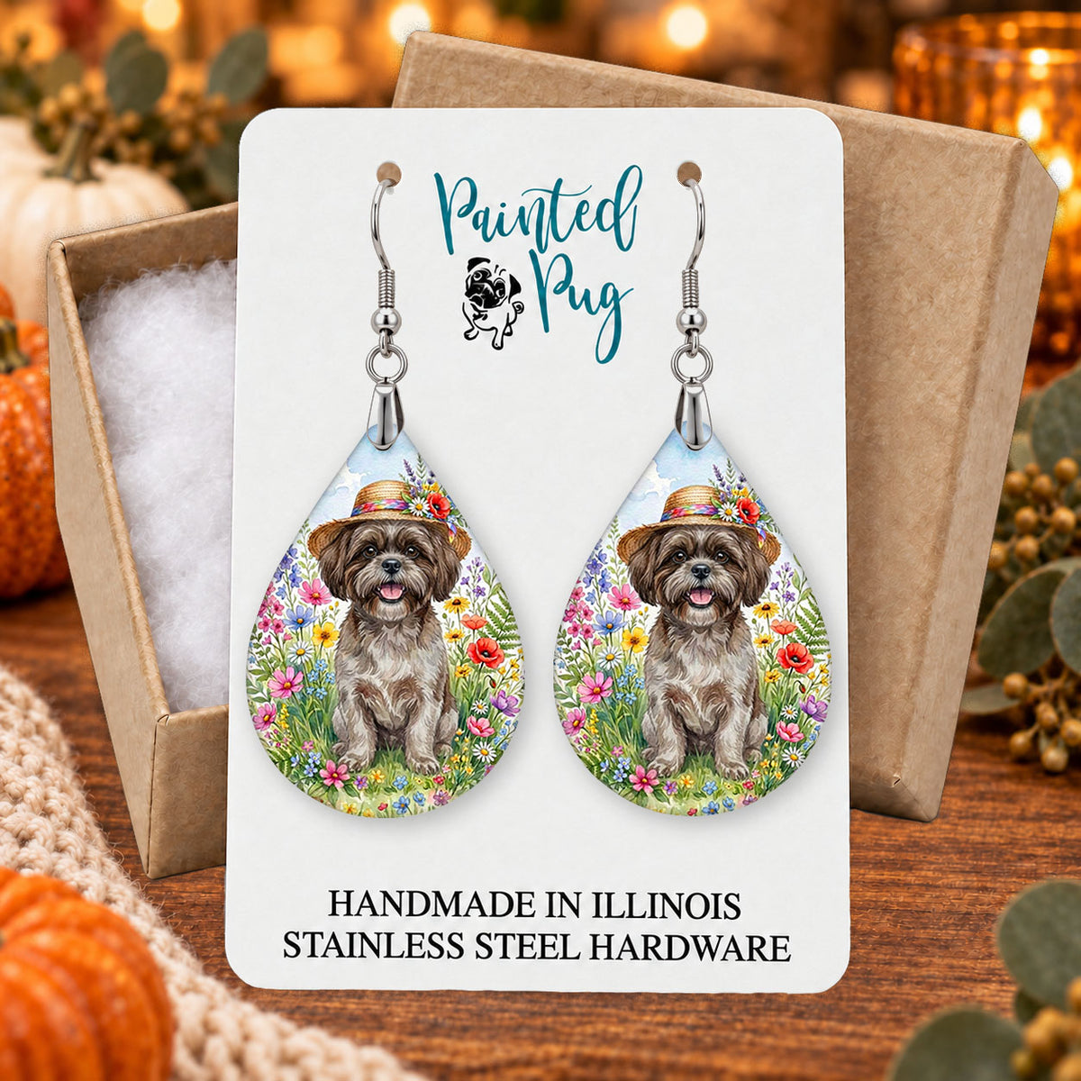 Grey Shih Tzu wildflower teardrop earrings gift boxed on a seasonal background