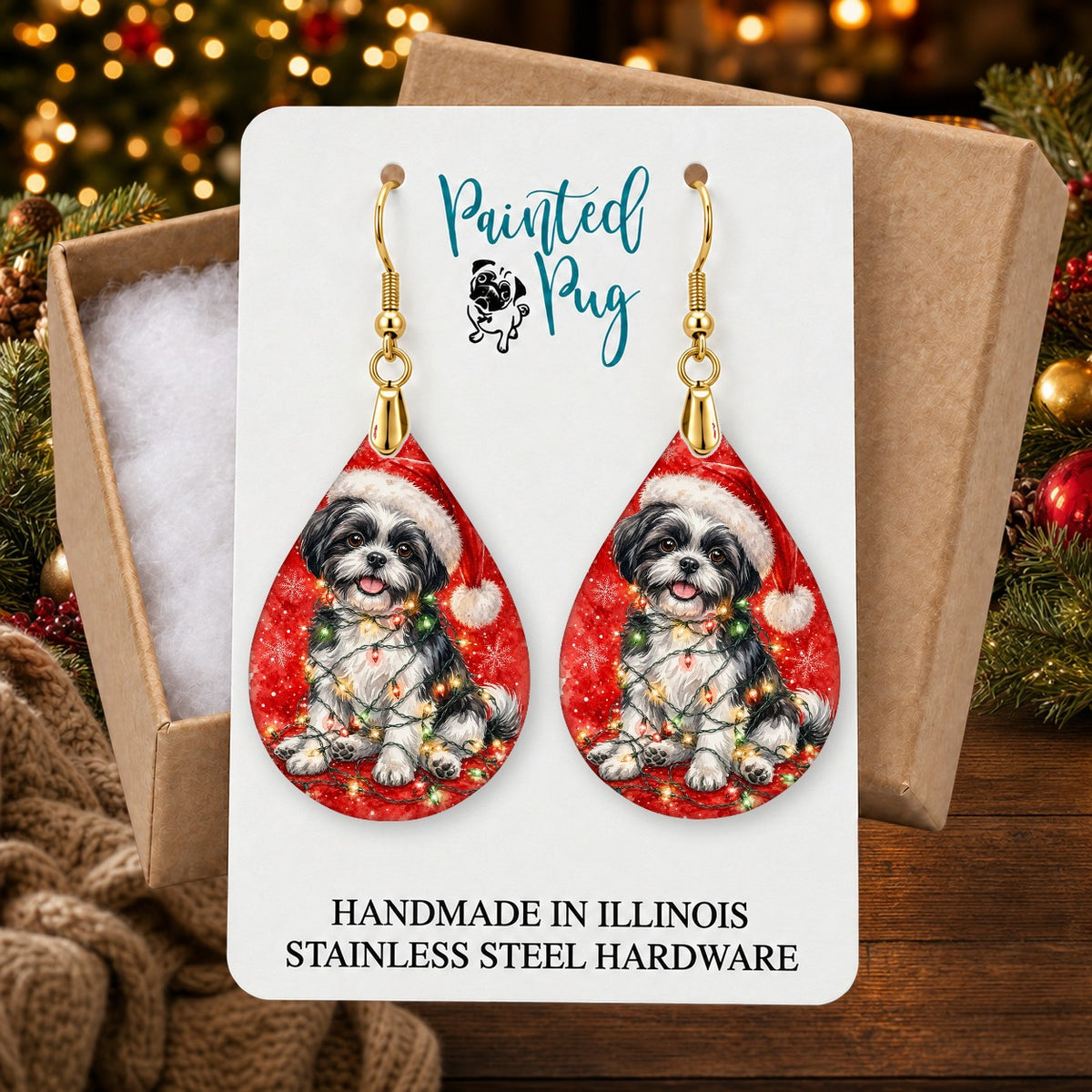 Black and White Shih Tzu Christmas Lights earrings in a gift box on a Christmas table