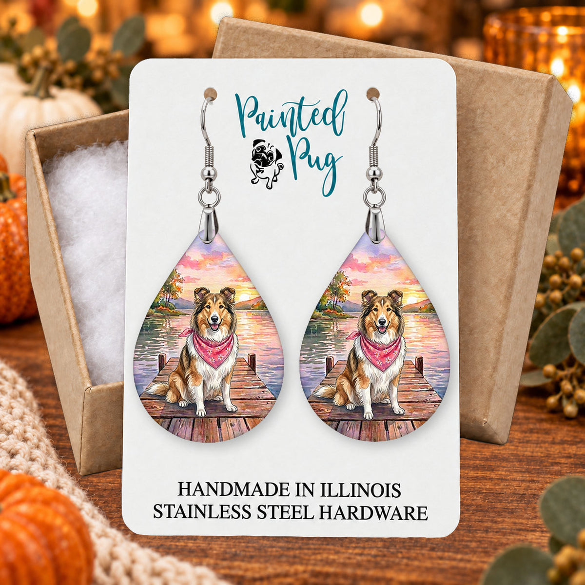 Collie lake teardrop earrings gift boxed on a seasonal background