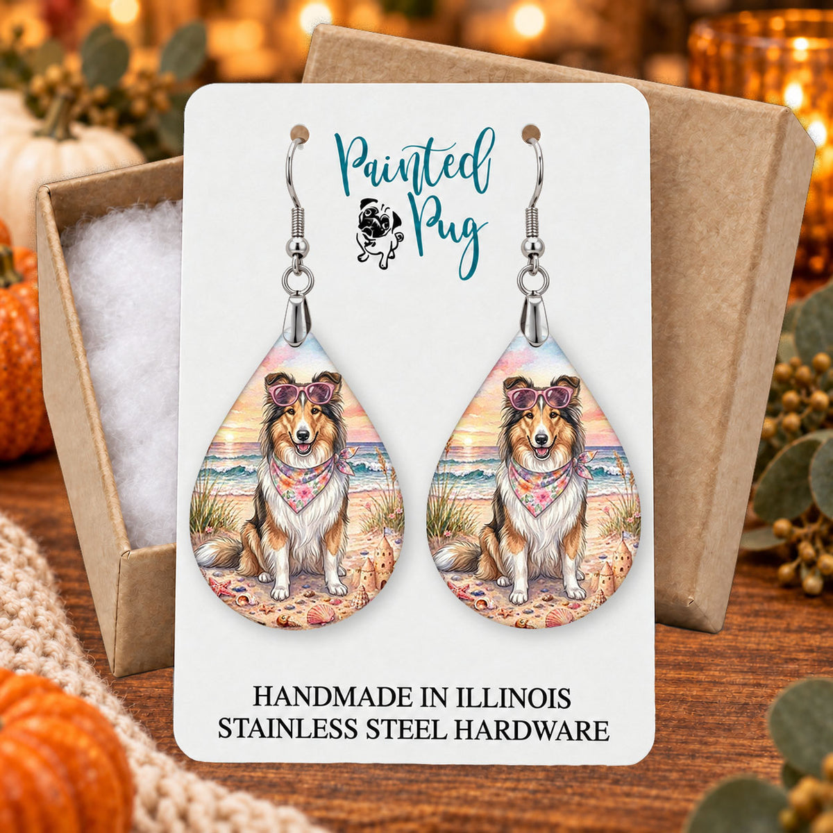 Collie beach teardrop earrings gift boxed on a seasonal background