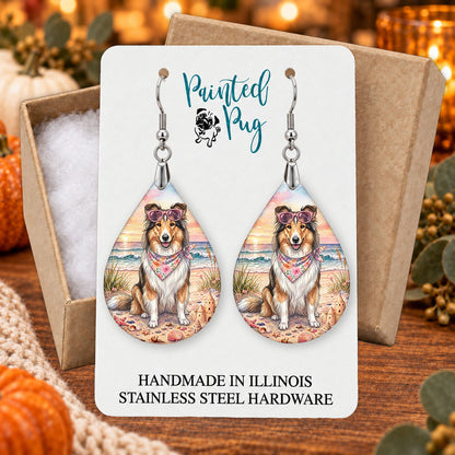 Collie beach teardrop earrings gift boxed on a seasonal background