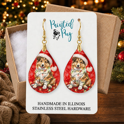 Collie Christmas Lights earrings in a gift box on a Christmas table