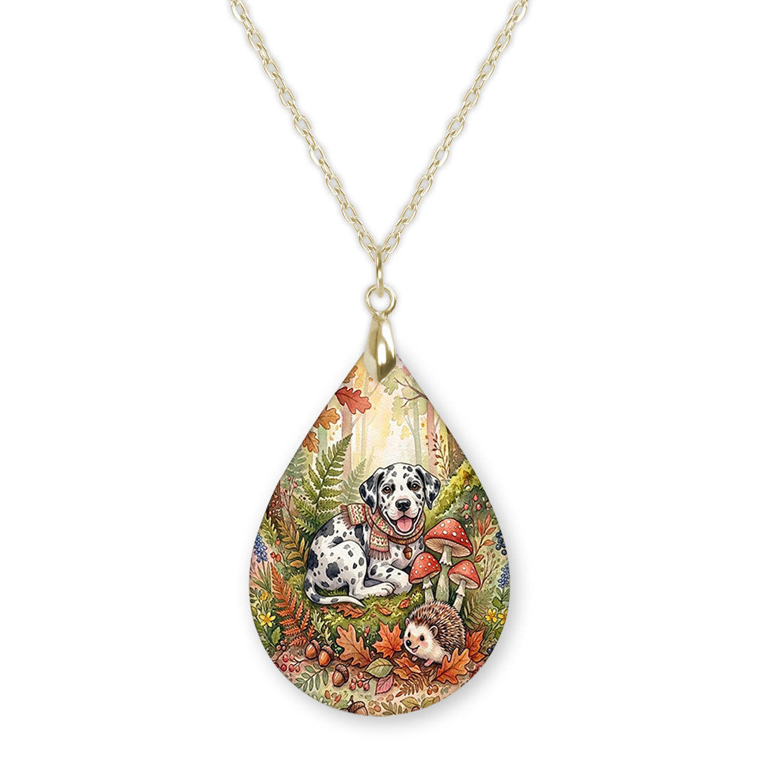 Harlequin Great Dane woodland teardrop pendant necklace on a gold-tone chain