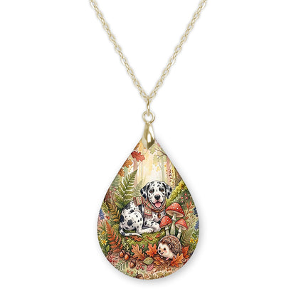 Harlequin Great Dane woodland teardrop pendant necklace on a gold-tone chain