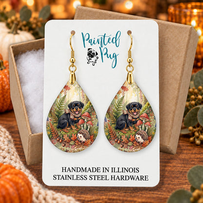 Rottweiler woodland teardrop earrings gift boxed on a cozy fall background