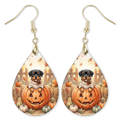 Rottweiler with a jack-o'-lantern teardrop earrings with gold-tone hooks