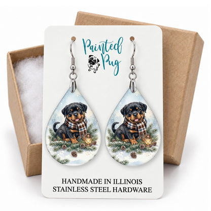 Rottweiler Winter Woodland teardrop earrings on a gift box card