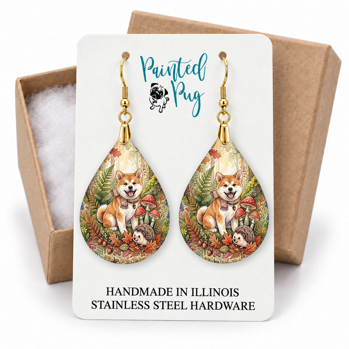 Akita woodland teardrop earrings on a Painted Pug earring card with a kraft gift box