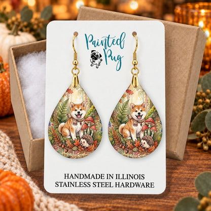 Akita woodland teardrop earrings gift boxed on a cozy fall background