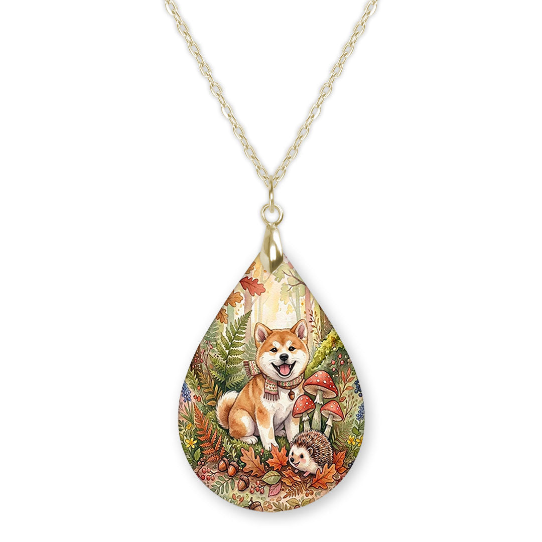 Akita woodland teardrop pendant necklace on a gold-tone chain