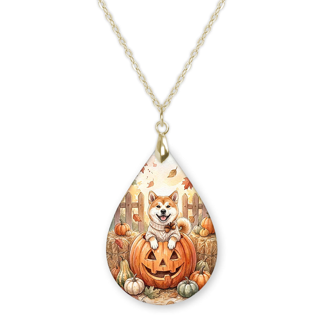 Akita pumpkin teardrop pendant necklace on a gold-tone chain
