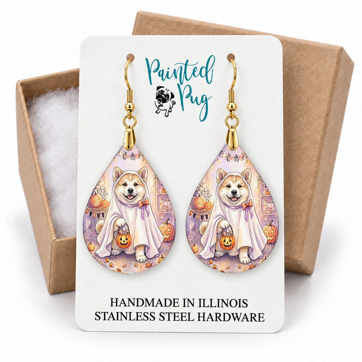 Akita ghost teardrop earrings on a Painted Pug earring card with a kraft gift box