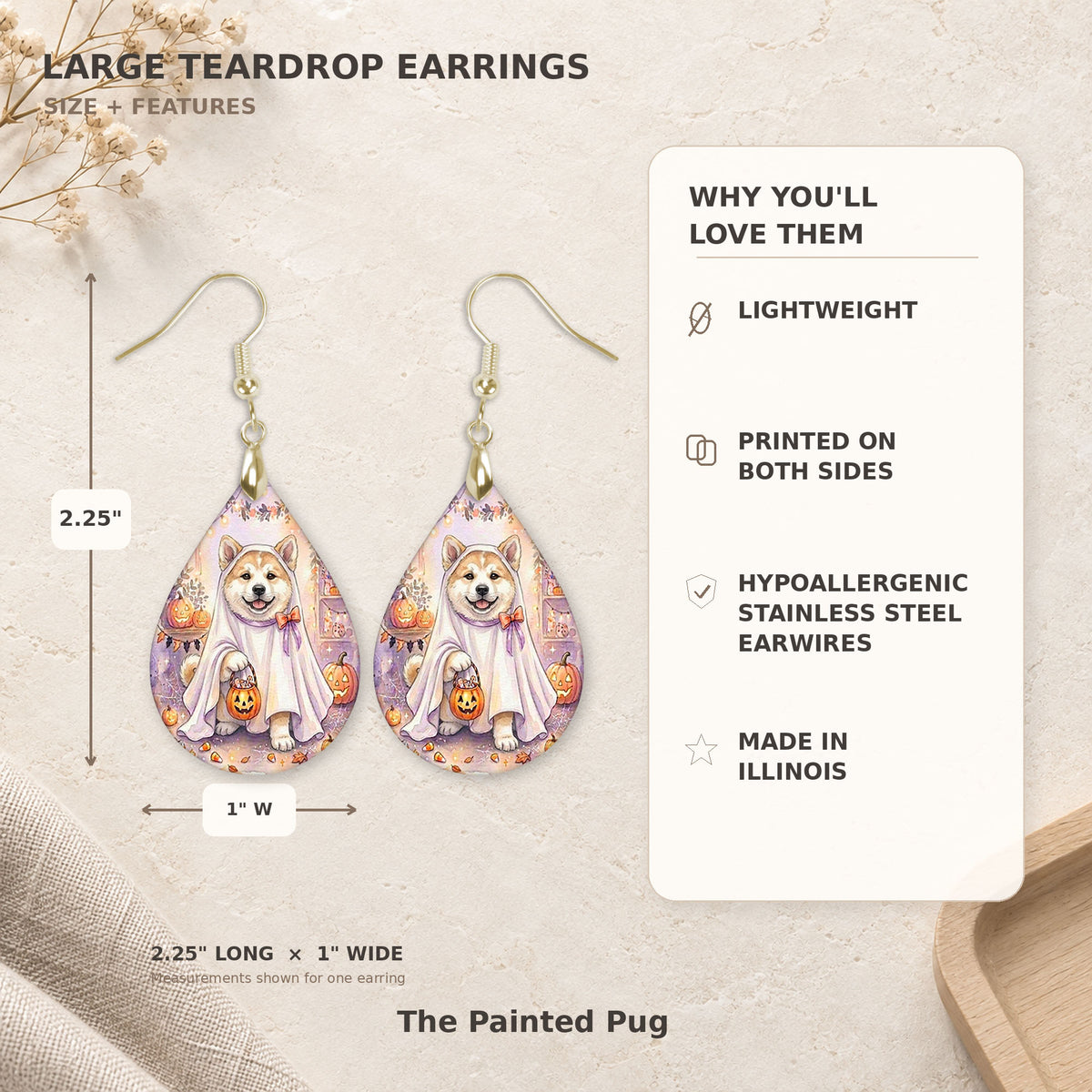 Size and features guide for the Akita ghost teardrop earrings, 2.25 inches long by 1 inch wide