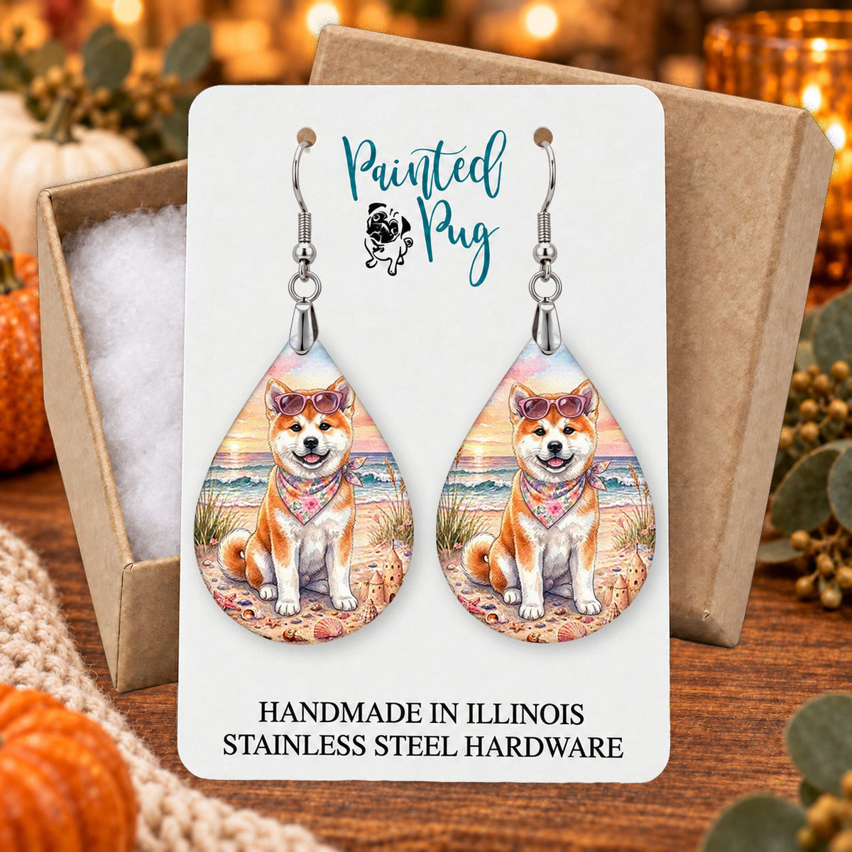 Akita beach teardrop earrings gift boxed on a seasonal background