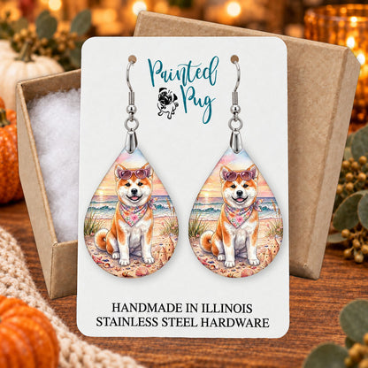 Akita beach teardrop earrings gift boxed on a seasonal background