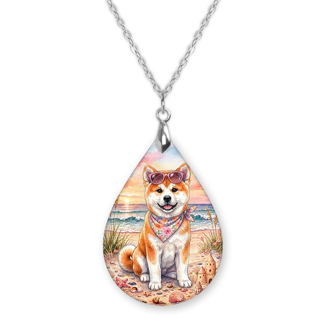 Akita beach teardrop pendant necklace on a silver-tone chain