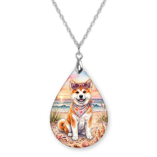 Akita beach teardrop pendant necklace on a silver-tone chain