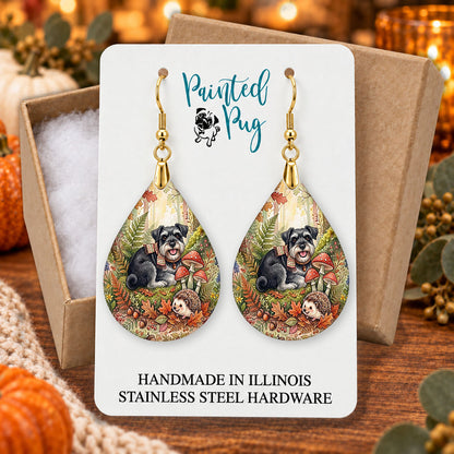 Black Schnauzer woodland teardrop earrings gift boxed on a cozy fall background