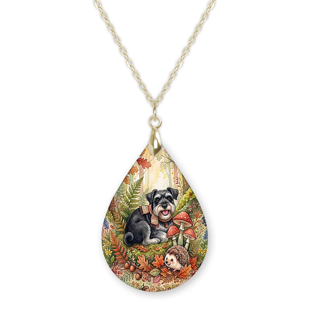 Black Schnauzer woodland teardrop pendant necklace on a gold-tone chain