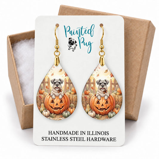 Schnauzer pumpkin teardrop earrings on a Painted Pug earring card with a kraft gift box
