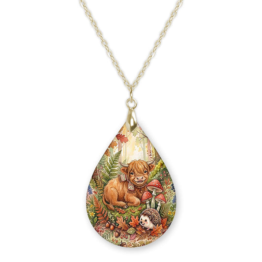 Highland Cow woodland teardrop pendant necklace on a gold-tone chain
