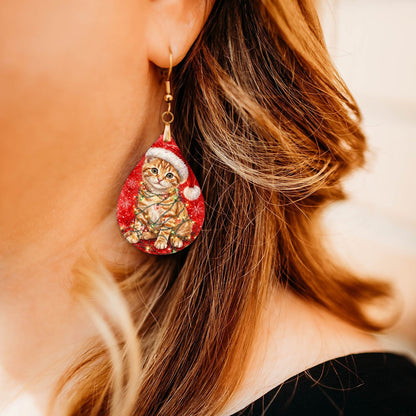 Tabby Cat Christmas Lights teardrop earrings worn by a model, close-up