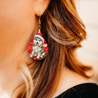 Husky Christmas Lights teardrop earrings worn by a model, close-up