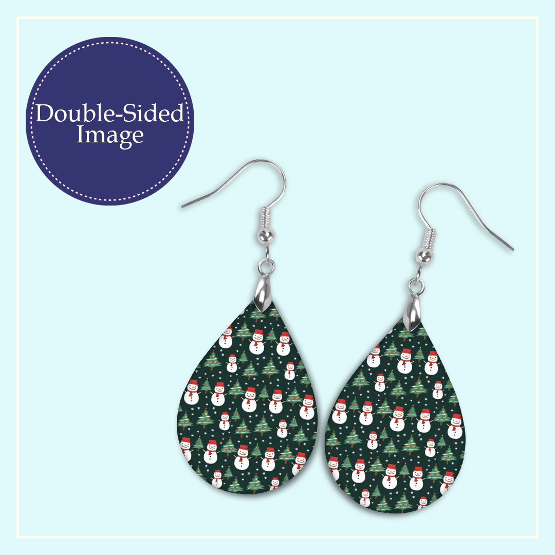Close-up of the snowman and Christmas tree teardrop earrings print design
