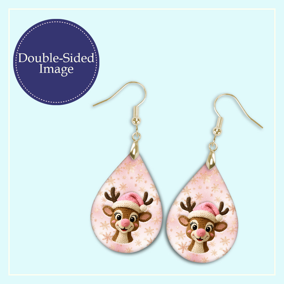 Close-up of the pink reindeer Christmas teardrop earrings print design