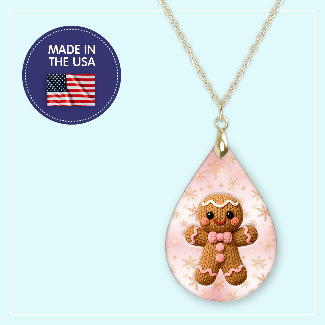 Pink gingerbread man Christmas teardrop earrings, handmade in the USA