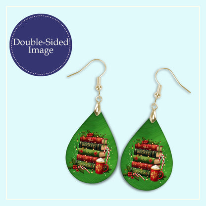 Close-up of the All Booked for Christmas book stack teardrop earrings print design