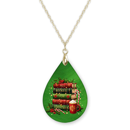 All Booked for Christmas book lover teardrop pendant necklace on a gold-tone chain