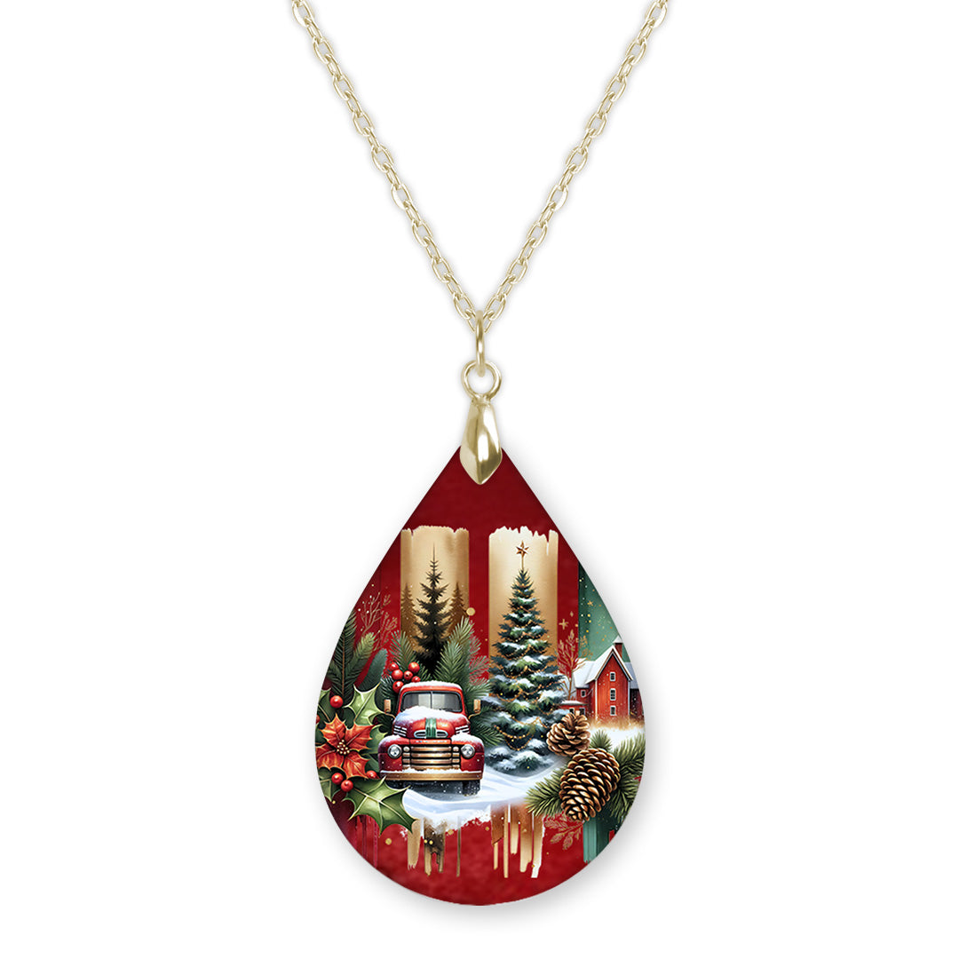 Red truck Christmas tree teardrop pendant necklace on a gold-tone chain