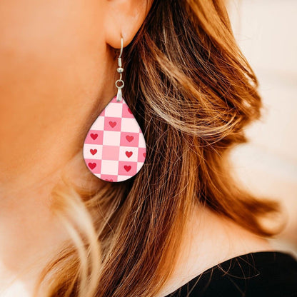 Heart Teardrop Earrings close-up on model