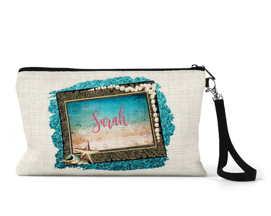 Personalized seashell frame beach Makeup Bag front view on a white background