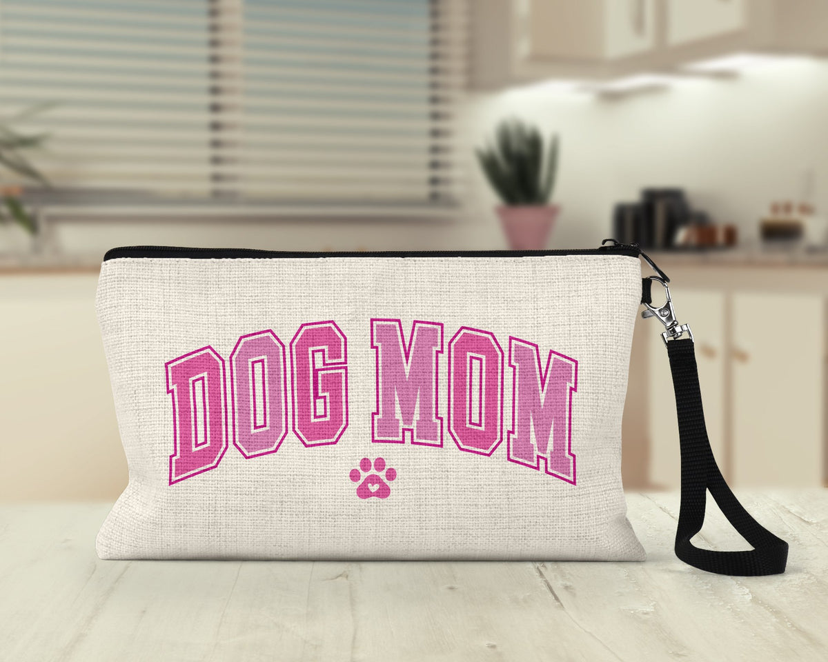 Dog Mom varsity Makeup Bag on a kitchen counter