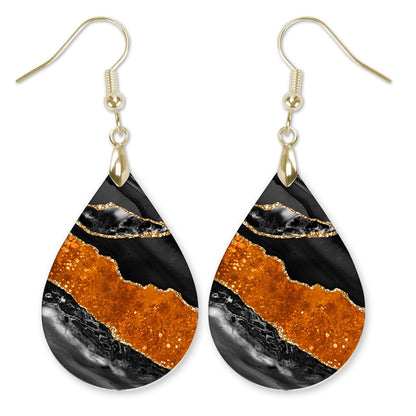 Black and orange agate teardrop earrings with gold veining and gold-tone earwires