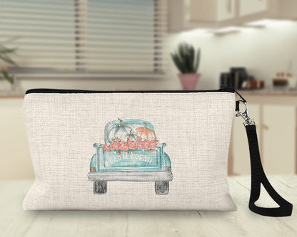 Aqua farm truck pumpkins Makeup Bag on a kitchen counter