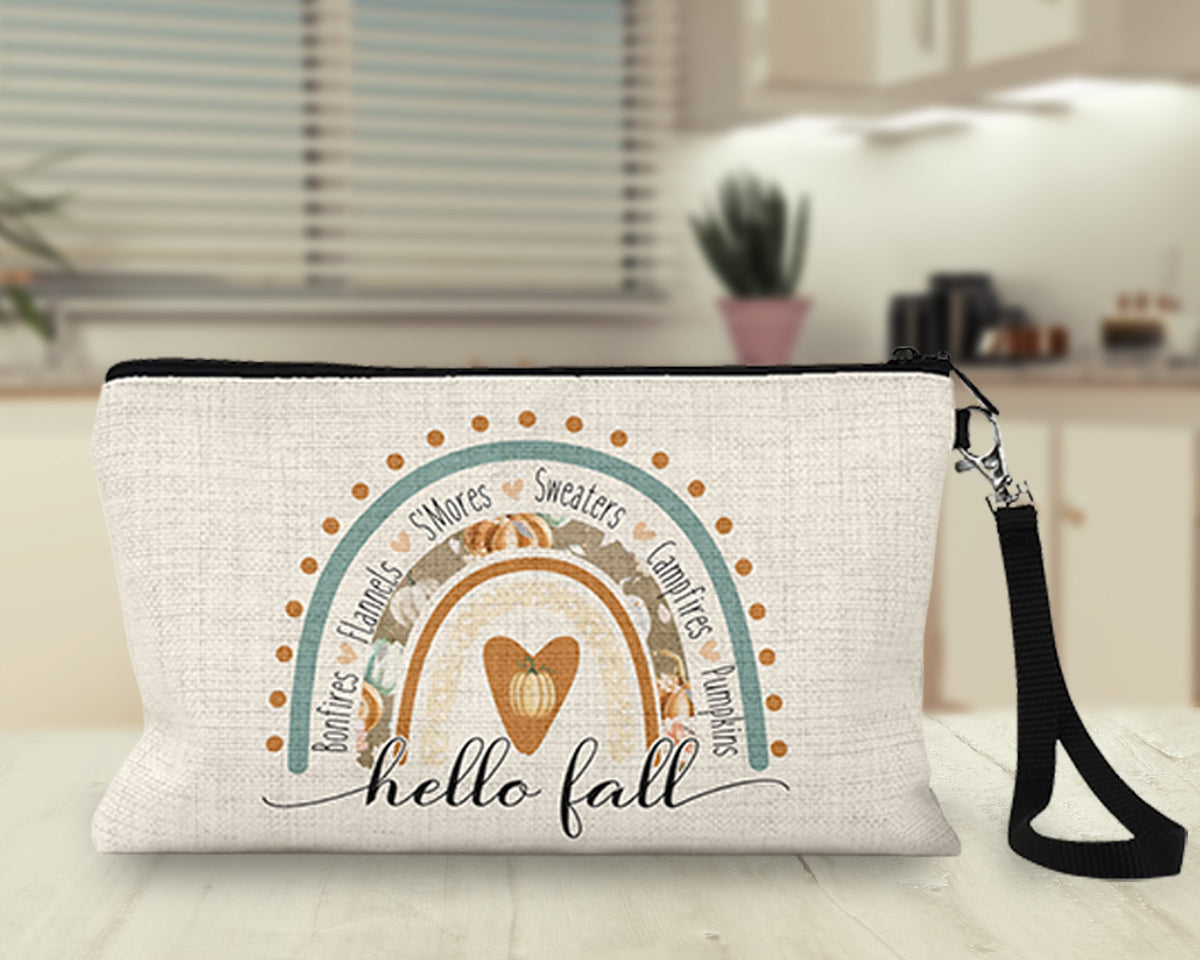 Hello Fall boho rainbow Makeup Bag on a kitchen counter