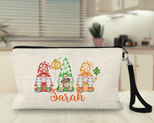 Personalized fall gnomes Makeup Bag on a kitchen counter