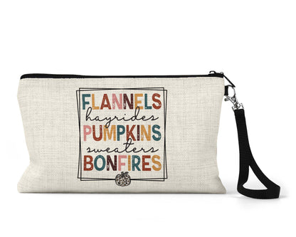 Flannels Hayrides Pumpkins Bonfires Makeup Bag front view on a white background