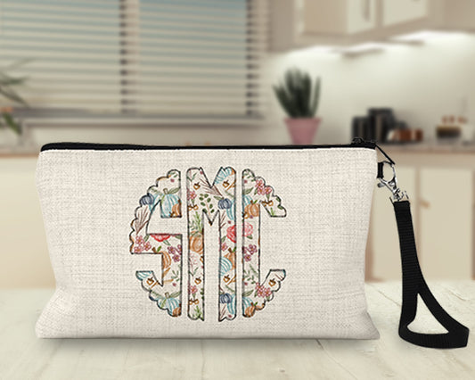 Personalized floral monogram Makeup Bag on a kitchen counter