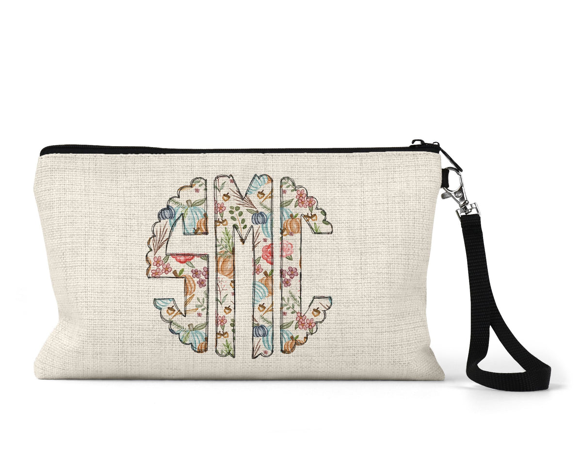 Personalized floral monogram Makeup Bag front view on a white background