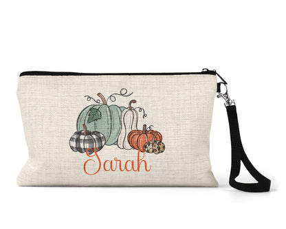 Personalized pumpkin patch Makeup Bag front view on a white background