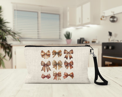 Fall Plaid Bows Makeup Bag on a kitchen counter
