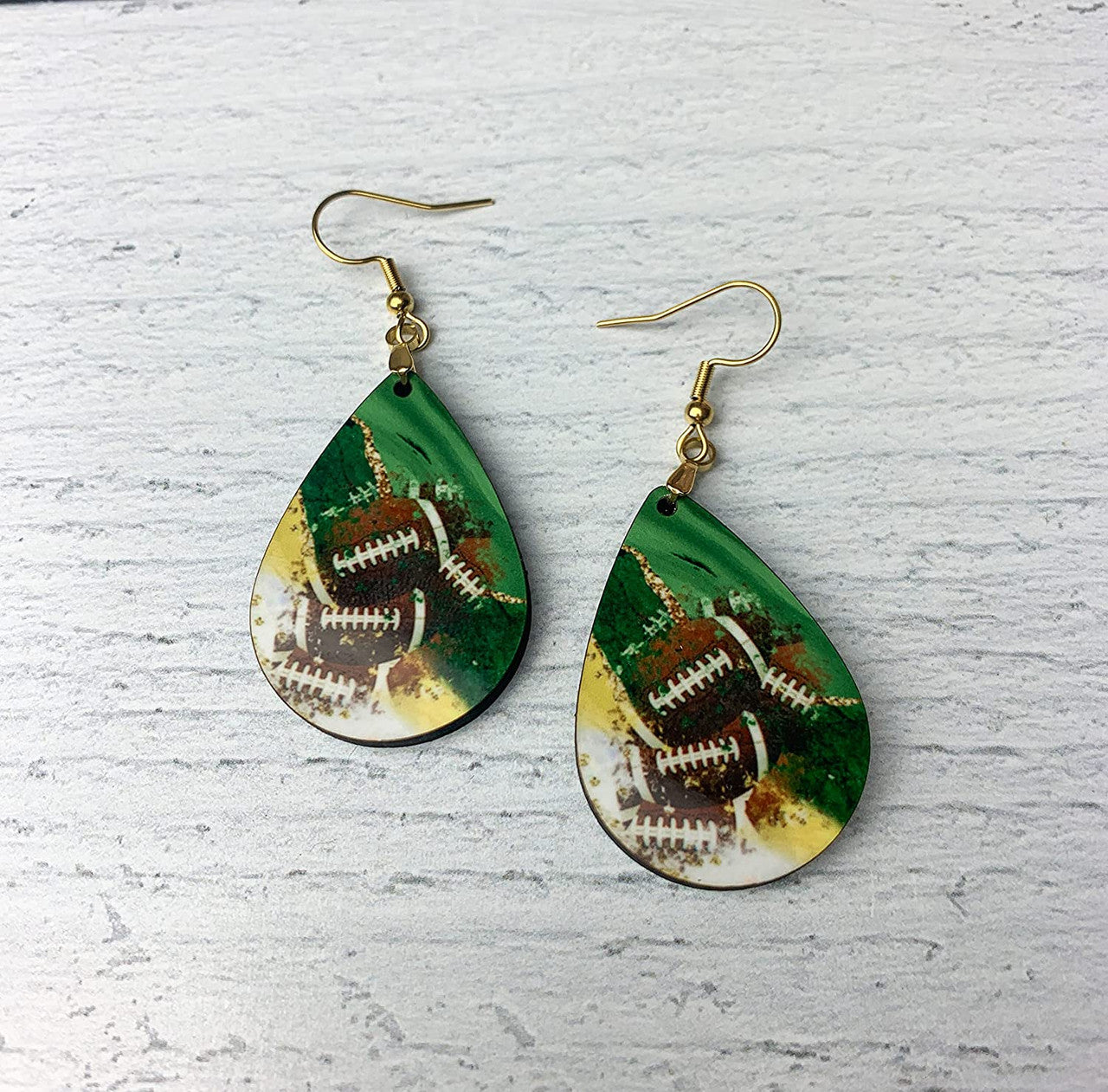 Green and Gold Football dangle earrings