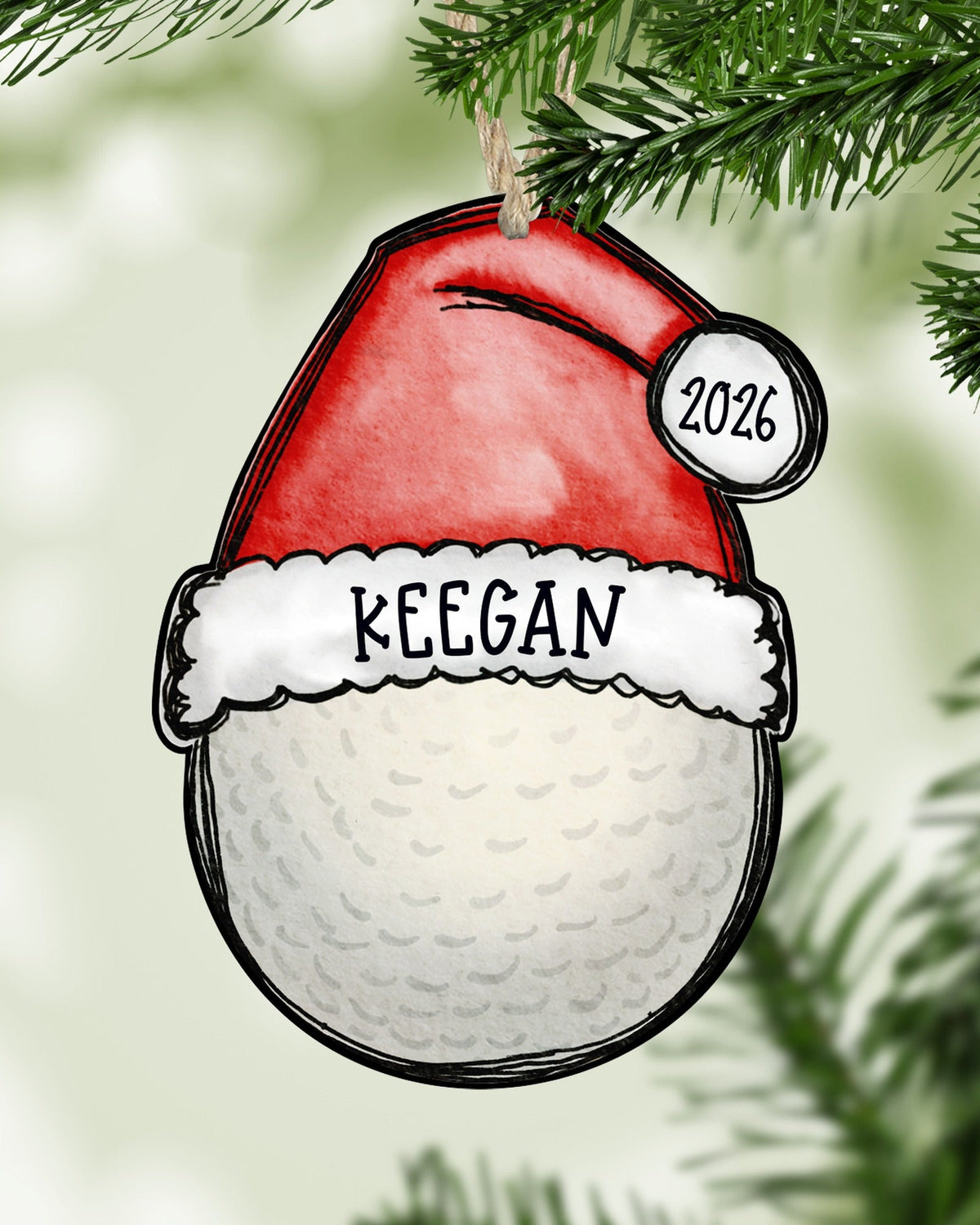 Personalized golf Christmas ornament hanging on a Christmas tree - The Painted Pug