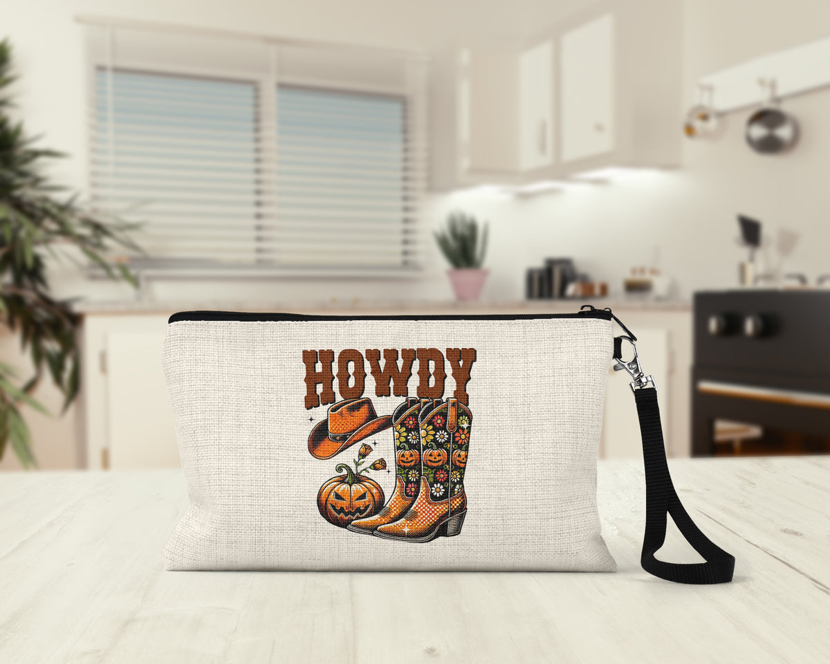 Howdy Cowboy Boots Makeup Bag on a kitchen counter