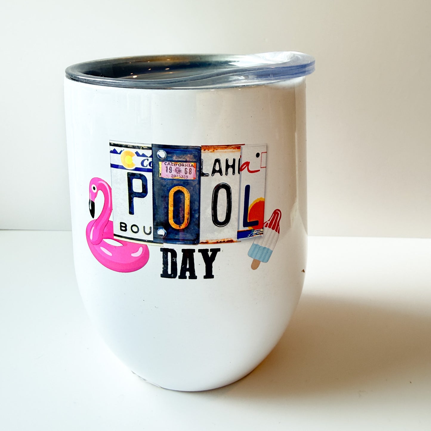 Pool Day 12oz Wine Tumbler with Lid – Flamingo Float and License Plate Letters